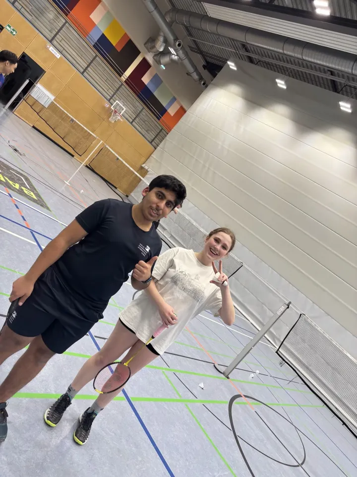 Parth and friend on the badminton court